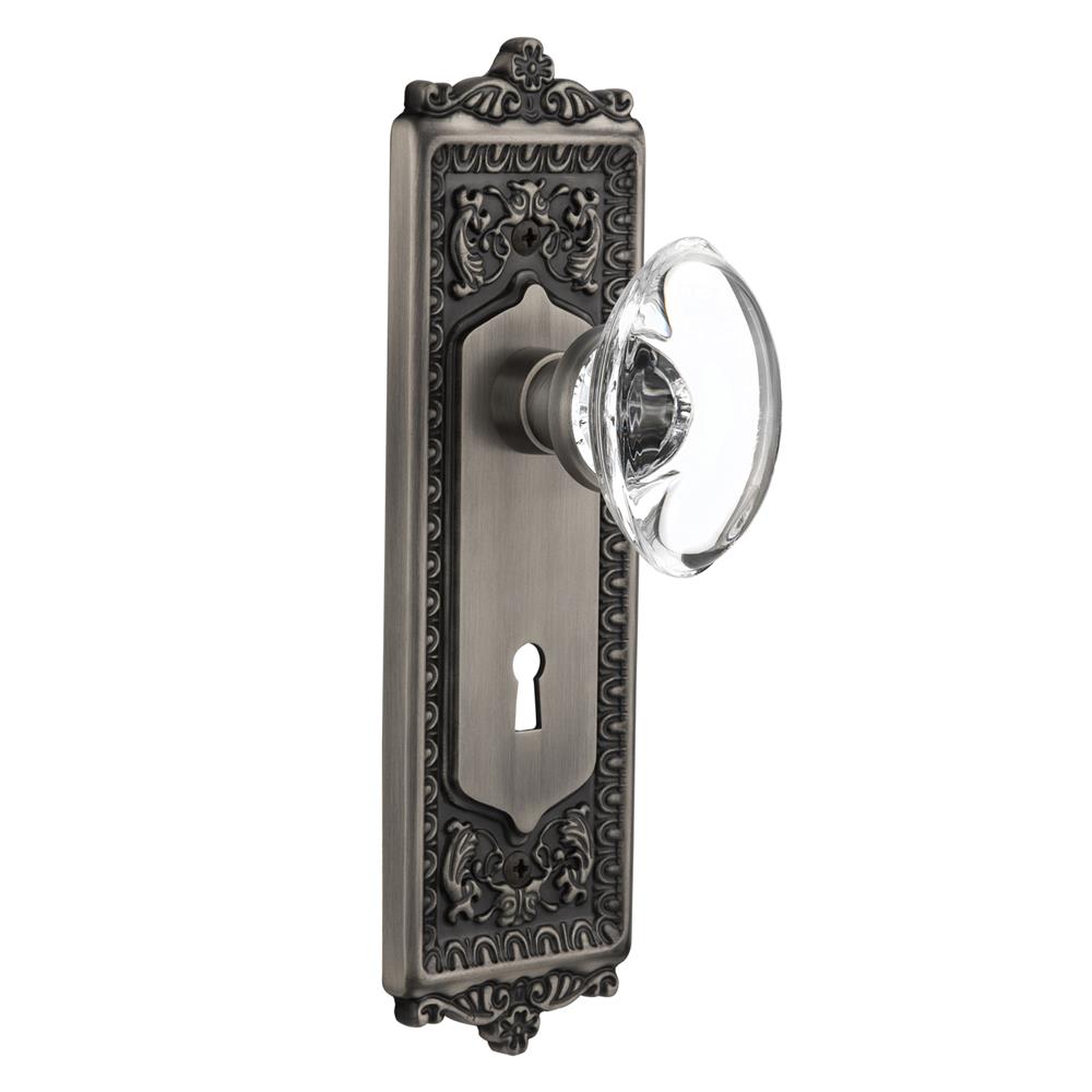 Nostalgic Warehouse EADOCC Mortise Egg and Dart Plate with Oval Clear Crystal Knob with Keyhole in Antique Pewter